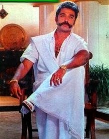 Actor Kamal Haasan wearing white vetti in the caste-pride themed film - Thevar Magan.